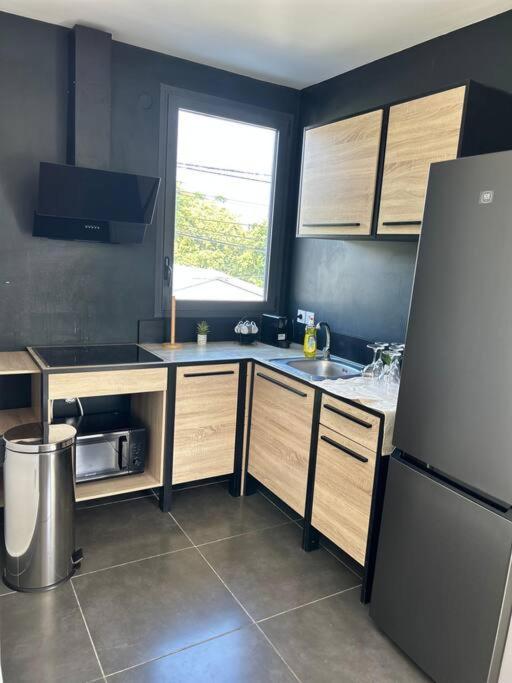 Appartement A 2 Pas De La Plage De Terre Sainte Bagian luar foto